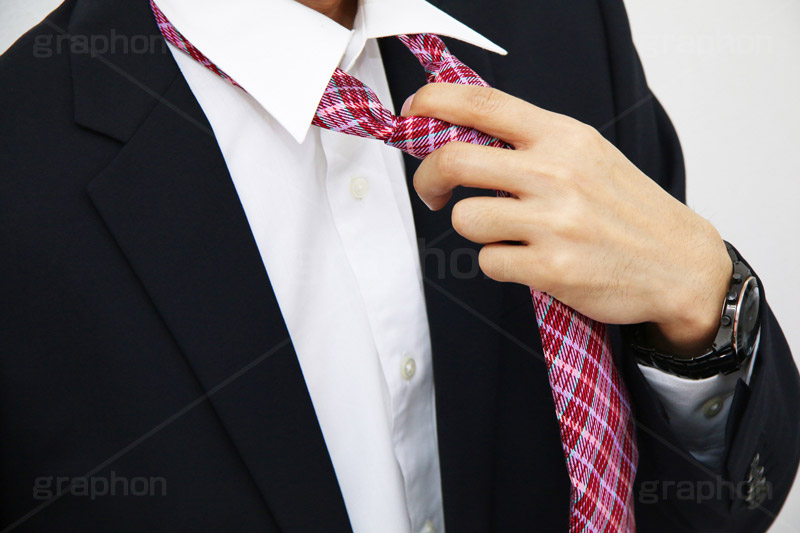 ネクタイを緩めるサラリーマン グラフォン無料素材