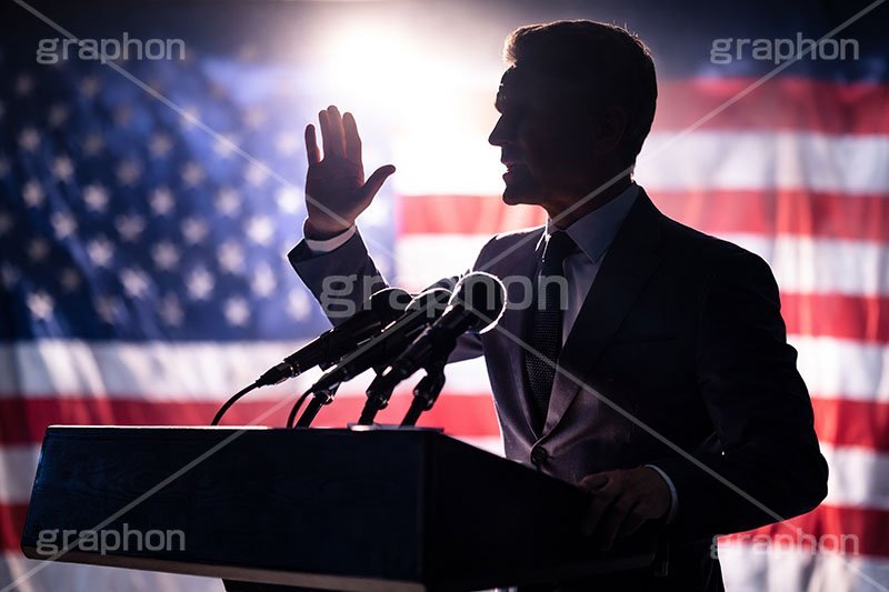 演説,記者会見,会談,スローガン,アピール,マイク,アメリカ,国旗,旗,国際,公約,宣言,発表,政治,首相,首脳,大統領,代表,経済,選挙,政権,速報,支持率,政策,政権交代,外交,人物,男性,男,シルエット,silhouette,hand,government,policies,mic,president,flag,country,america,AI生成素材